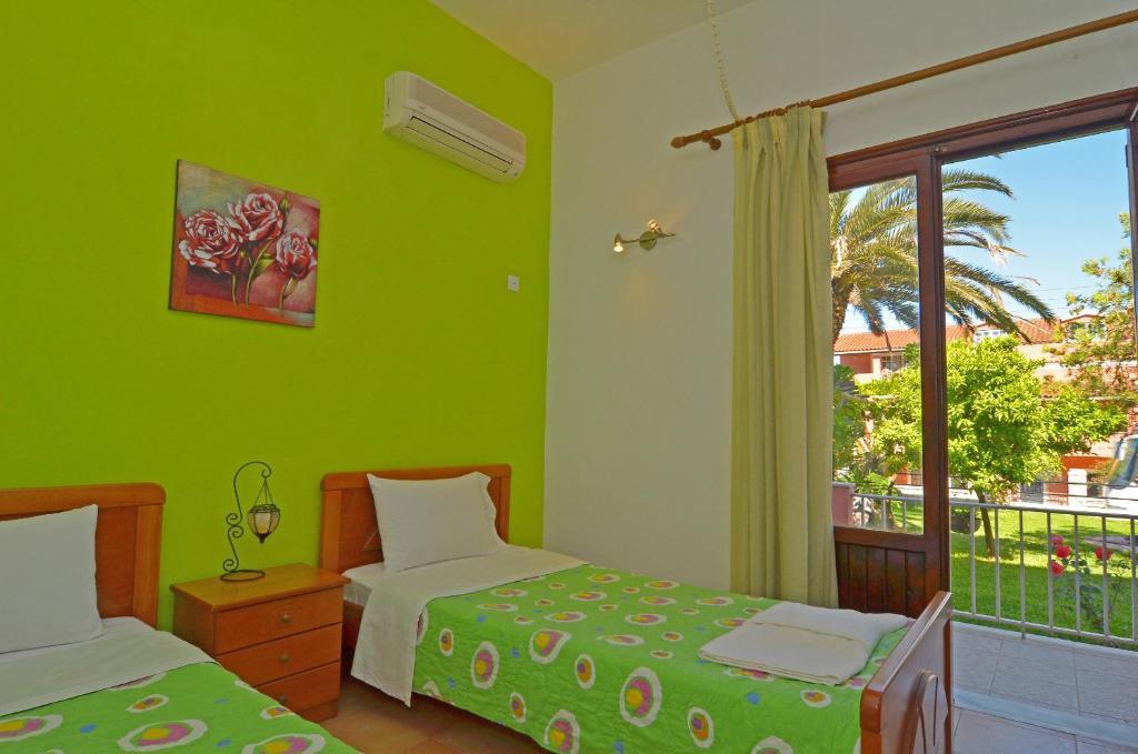 Othonas Apartments Sidárion Pokoj fotografie